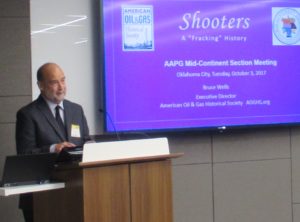 Bruce Wells, executive director of the American Oil & Gas Historical Society (AOGHS), making a 2017 presentation, Shooters -- A "Fracking" History," during the Oklahoma City meeting of the American Association of Petroleum Geologists (AAPG).