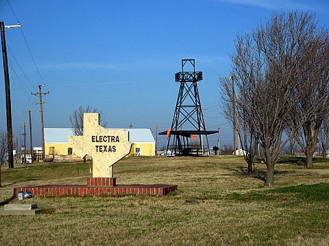 Electra-news-AOGHS-W Welcome to Electra, Texas, sign in the shape of Texas with derrick, pump jack and picnic table.