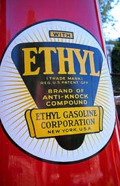Closeup of circa 1930 red, circular gasoline pump with Ethyl Gasoline Corporation signage "Ethyl Brand of Anti-Knock Compound."