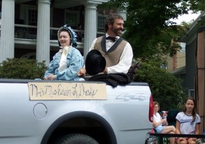 Events-Titusville-AOGHS Titusville oil parade with "Mr. and Mrs. Edwin Drake" in back of pickup truck.