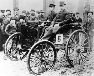 J. Frank Duryea seated in his gas-powered automobile.