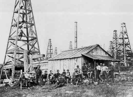 Oilfield photographer John Mather oilfield images of workers and derricks.