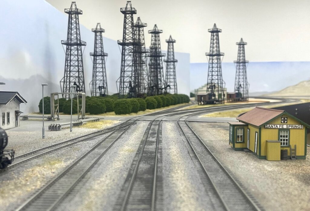 Model RR scene of derricks at a California refinery circa 1950s.refinery