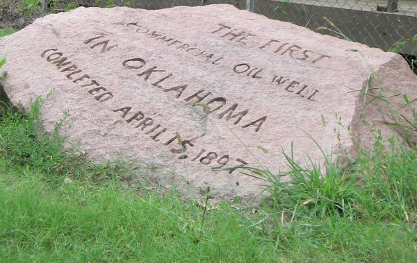 Nellie-Johnstone-marker-AOGHS A pink granite rock marks the spot of the 1897 first commercial Oklahoma oil well.