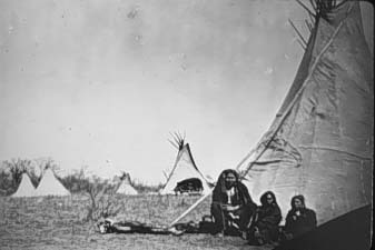 Photo-Oklahoma-GenWeb-AOGHS Native Americans sit at Tepees.