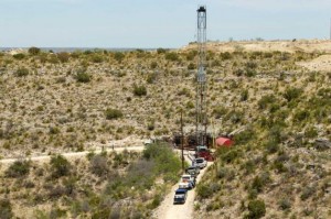 Drilling rig in Yates oilfield in Pecos County, Texas.