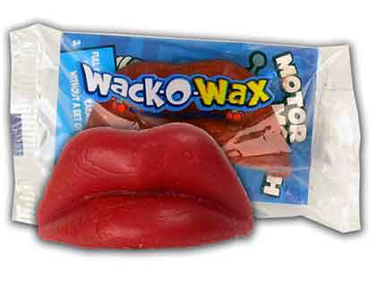 Close-up of Wack-O-Wax lips and package of the red petroleum product wax-candy lips.