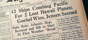 Newspaper headline notes 42 ships looking for lost air race planes.